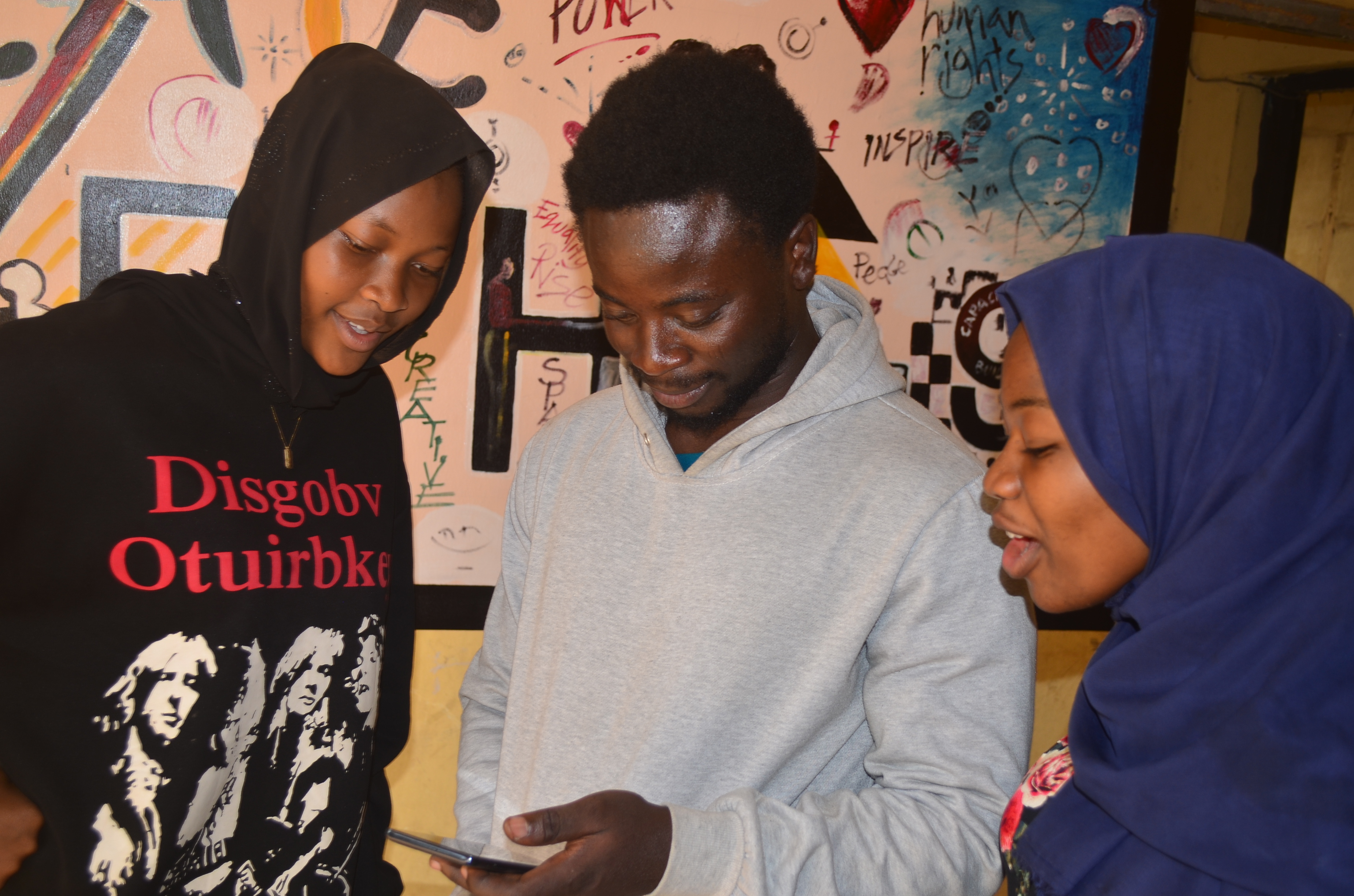 Visitors exchanging ideas inside Prikkle Academy's Afon Makerspace